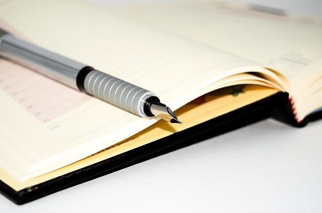 An open notebook with handwritten notes on time management, reflecting routine optimization.